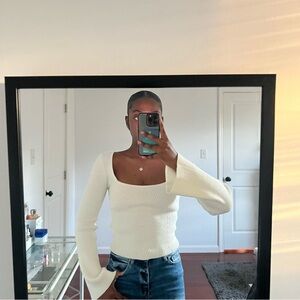 White long sleeve top